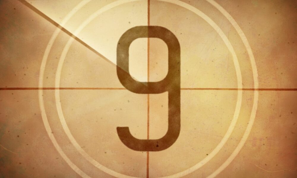 A vintage film countdown showing the number 9 inside a circular frame with a sepia-toned background and marked lines, resembling old film reel countdowns used in classic cinema. The texture is aged, giving a nostalgic feel. It's perfect for companies creating content with social media must-dos in mind.