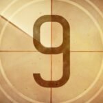 A vintage film countdown showing the number 9 inside a circular frame with a sepia-toned background and marked lines, resembling old film reel countdowns used in classic cinema. The texture is aged, giving a nostalgic feel. It's perfect for companies creating content with social media must-dos in mind.
