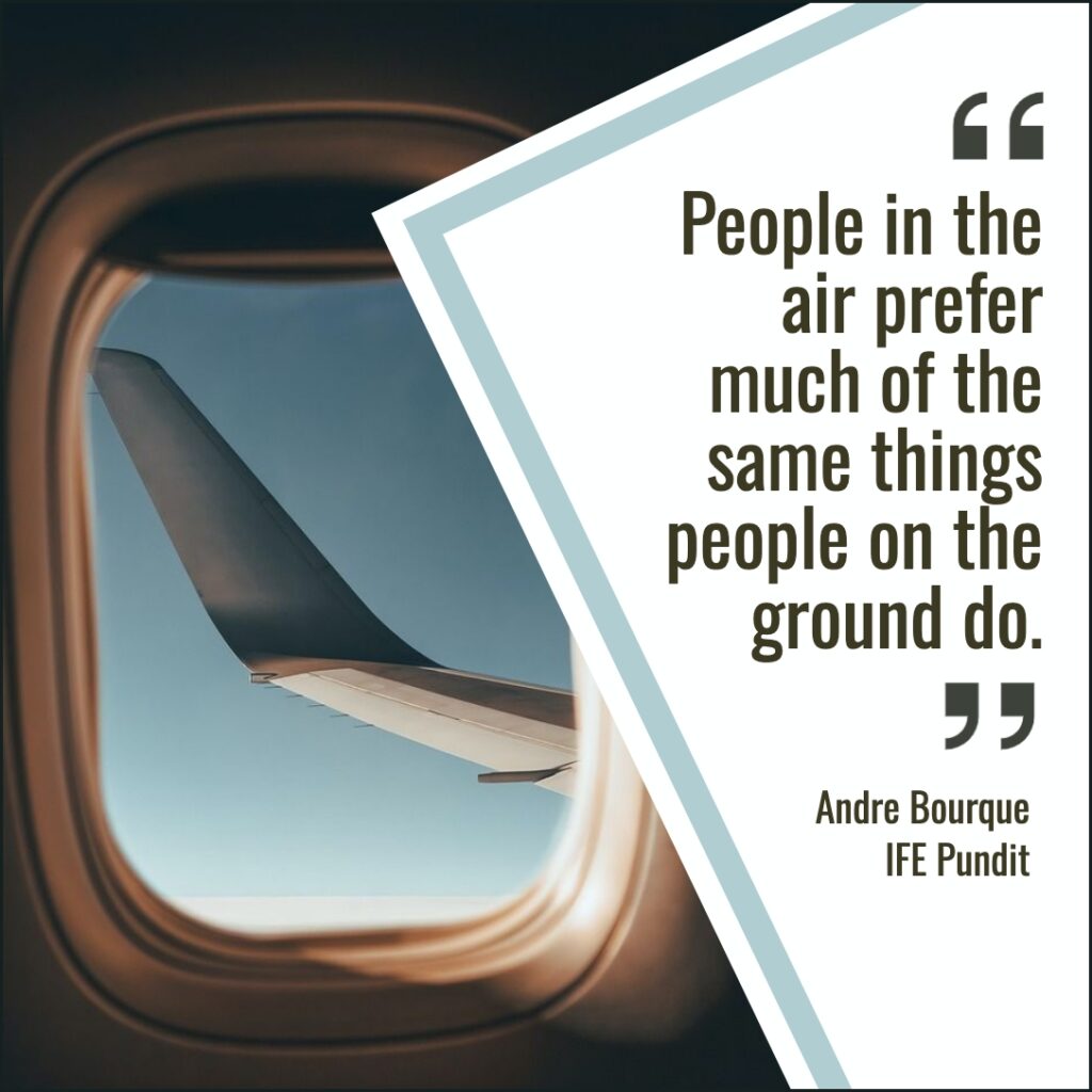 View from an airplane window showing the aircraft wing against a clear blue sky, with a quote superimposed on the right that reads, "People in the air prefer much of the same things people on the ground do." - Andre Bourque, In-Flight Entertainment Pundit.